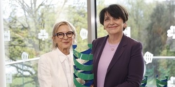 Therese Kinsella accepting prize from UCD President